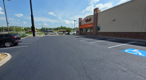 Freshly sealcoated restaurant parking lot
